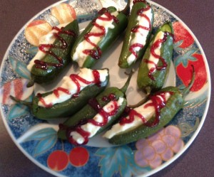 Two Sisters Cherry Bomb Hot Pepper Jam Drizzled on Cream Cheese Jalapeno Peppers
